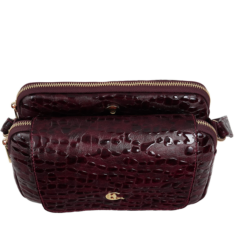 Damska torebka skórzana Canaletto z klapką i ozdobnym frędzlem TD705s337