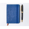 Granatowy notes w formacie A6 zadrukowany w linie - Peterson