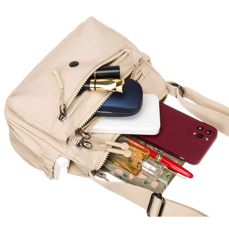 Beżowa listonoszka damska wykonana z poliestru - Peterson