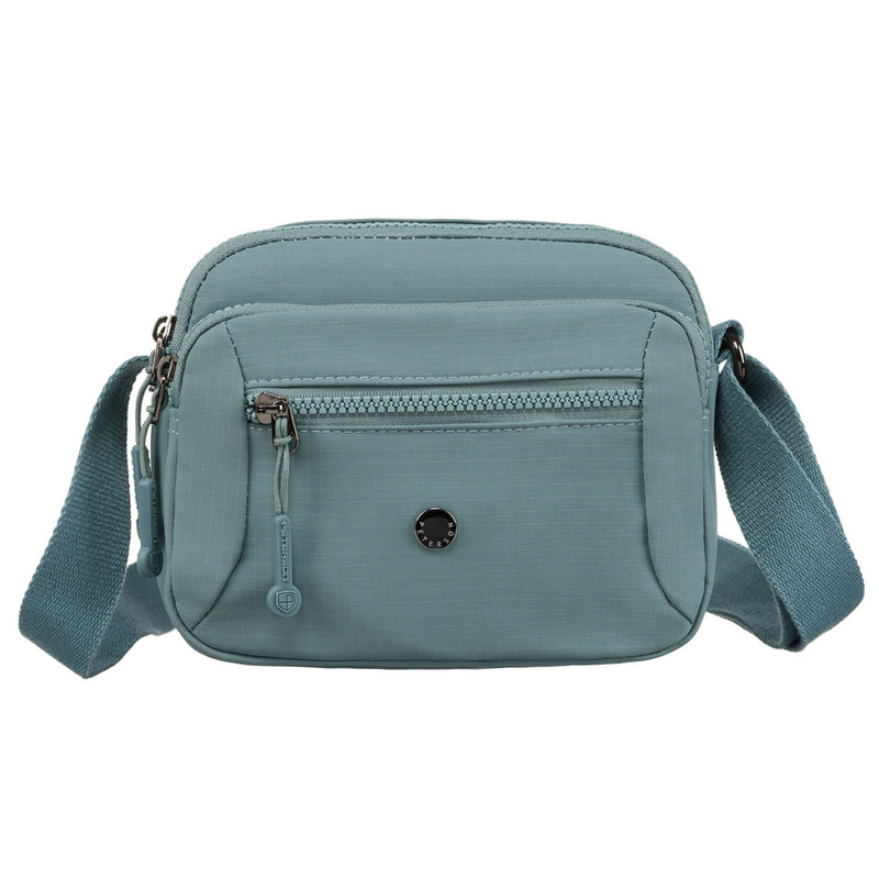 Praktyczna, niebieska listonoszka damska zawieszona na regulowanym pasku - Peterson