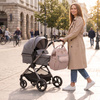 Beżowy plecak mommy-bag wykonany z poliestru, dwukomorowy i zamykany suwakiem - Peterson