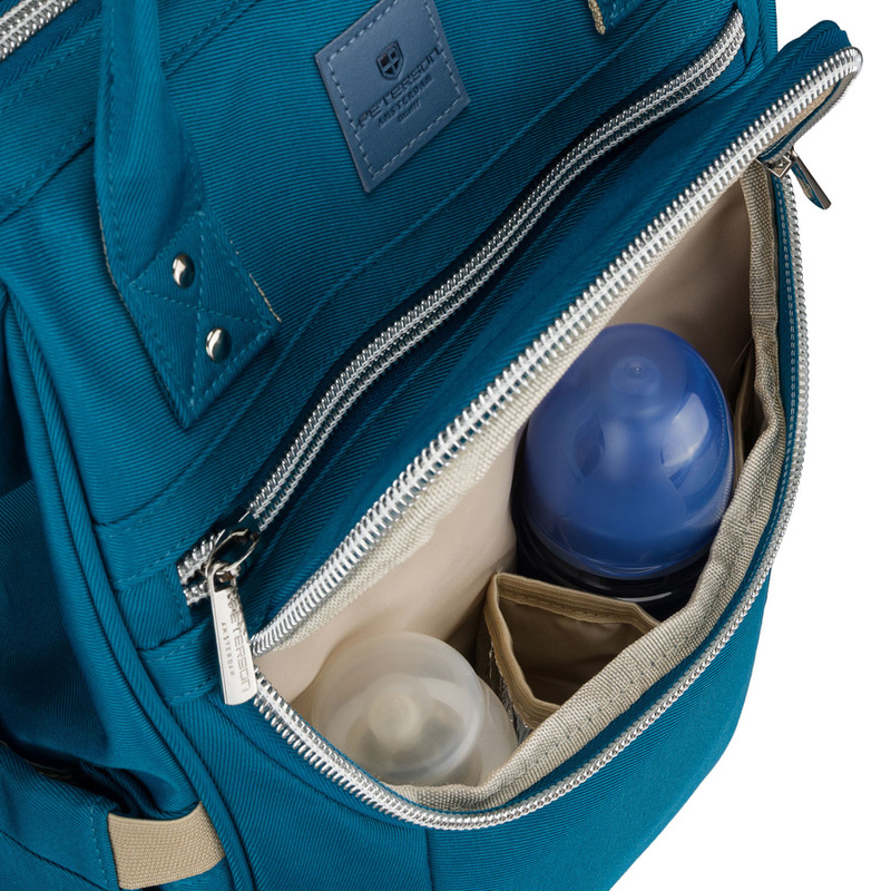Plecak mommy-bag wykonany z poliestru w turkusowym kolorze, zamykany suwakiem - Peterson