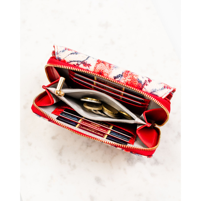 Wielokolorowy portfel damski wykonany ze skóry ekologicznej, ozdobiony kwiatowym wzorem - Peterson