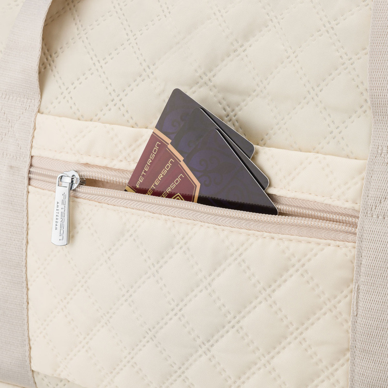 Sportowa, treningowa torba w beżowym kolorze wykonana z poliestru - Peterson