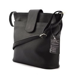 Skórzana damska listonoszka zapinana przez ramię