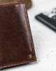 Rovicky męski składany portfel skóra naturalna rozbudowany pionowy RFID
