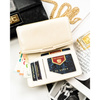 Portfel damski ze skóry ekologicznej w kolorze ecru, wyposażony w system RFID - Peterson
