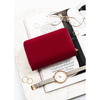 Bordowy portfel damski wykonany ze skóry ekologicznej, zamykany zatrzaskiem - Peterson