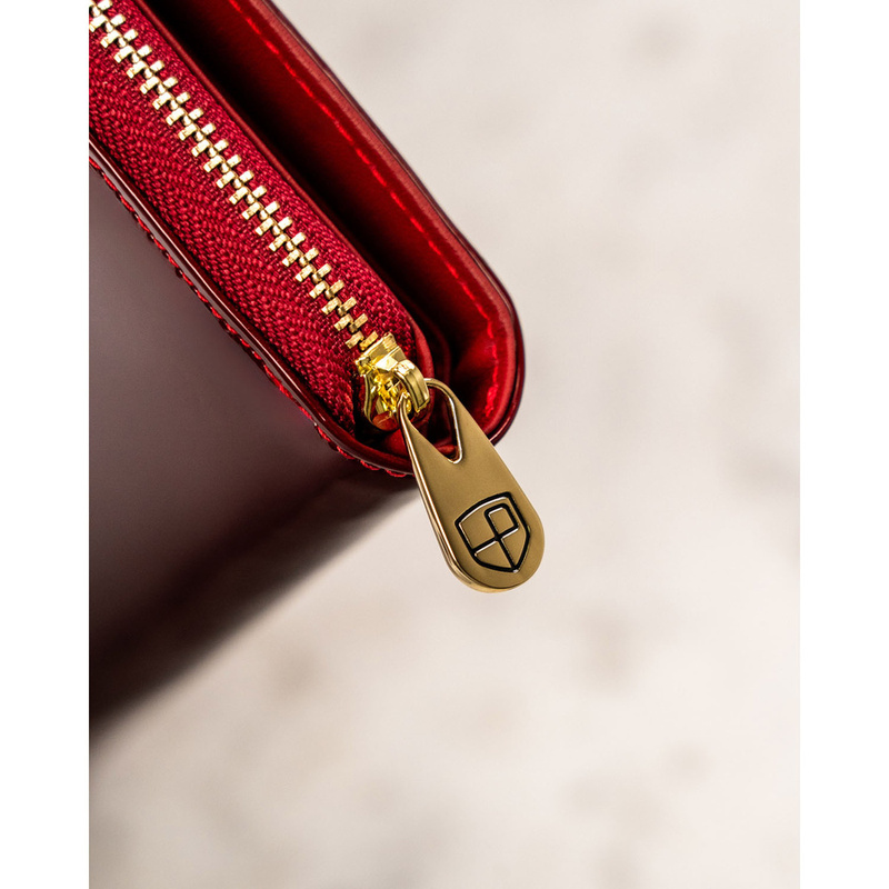 Lakierowany, pionowy skórzany portfel damski w czerwonym kolorze - Peterson