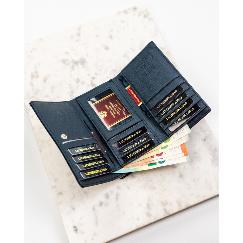 Portfel damski ze skóry naturalnej i ekologicznej w granatowym kolorze zamykany na zatrzask i bigiel - Peterson