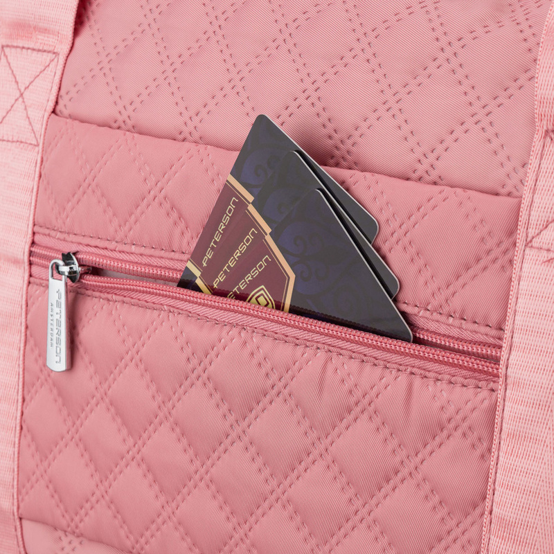 Treningowa torba wykonana z poliestru w różowym kolorze, zawieszona na wygodnych uchwytach - Peterson