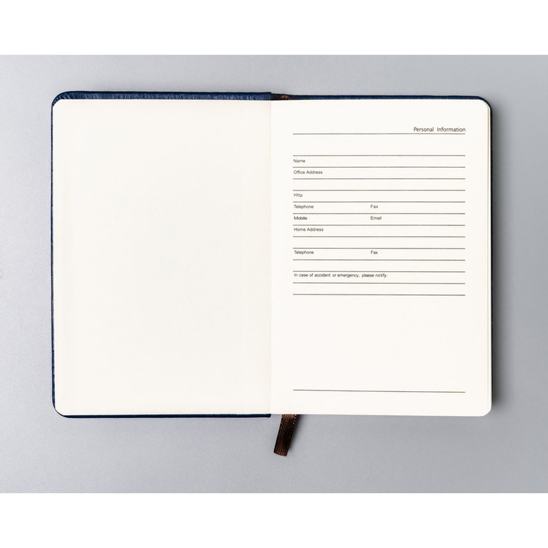 Granatowy notes w formacie A6 zadrukowany w linie - Peterson