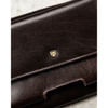 Skórzana, dwukomorowa saszetka męska w brązowym kolorze zamykana suwakiem - Rovicky