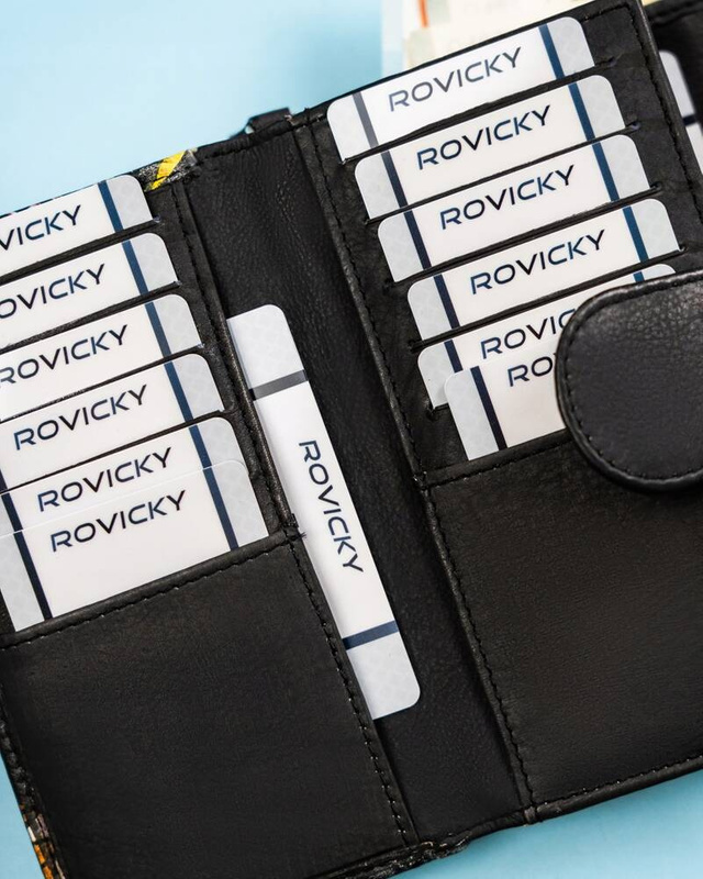 Rovicky Pojemny skórzany portfel damski na zatrzask roślinny wzór