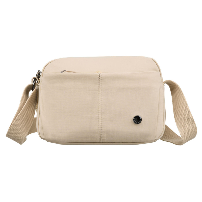 Listonoszka damska w beżowym kolorze zawieszona na regulowanym pasku - Peterson