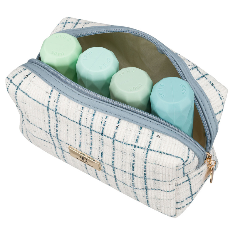 Niebieska, pojemna kosmetyczka damska wykonana z materiału syntetycznego - Rovicky