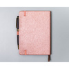 Różowy notes w formacie B6 zadrukowany w linie, wyposażony w gumkę zamykającą - Peterson