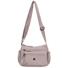 Poręczna torebka damska w kolorze lila zawieszona na regulowanym pasku - Peterson